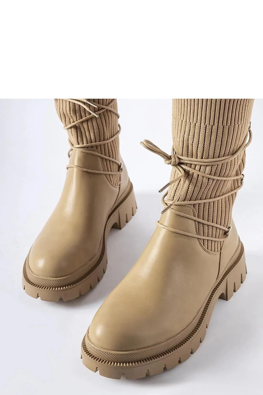 Beige sock boots with Eliot binding