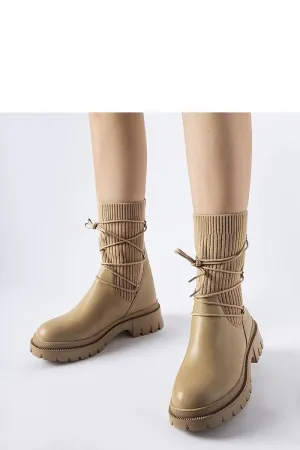 Beige sock boots with Eliot binding